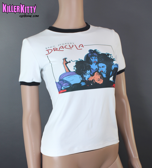 White ringer tee with black trim featuring a hand-printed image of characters from the movie Dracula. vampire horror brides sub culture horror tees. retro alternative 90s horror movie t shirt. Xgirl horror punk shirt. Horror women girl ladies move t shirt. Fandom horror shirt. Original dracula horror movie t shirt for women ladies. Alternative horror ogoth clothes. Killer kitty Clothing horror t shirts. Killer Kitty Horror Alternative Clothes for 20 years. Dracula horror t shirt blouse vest. Women's horror