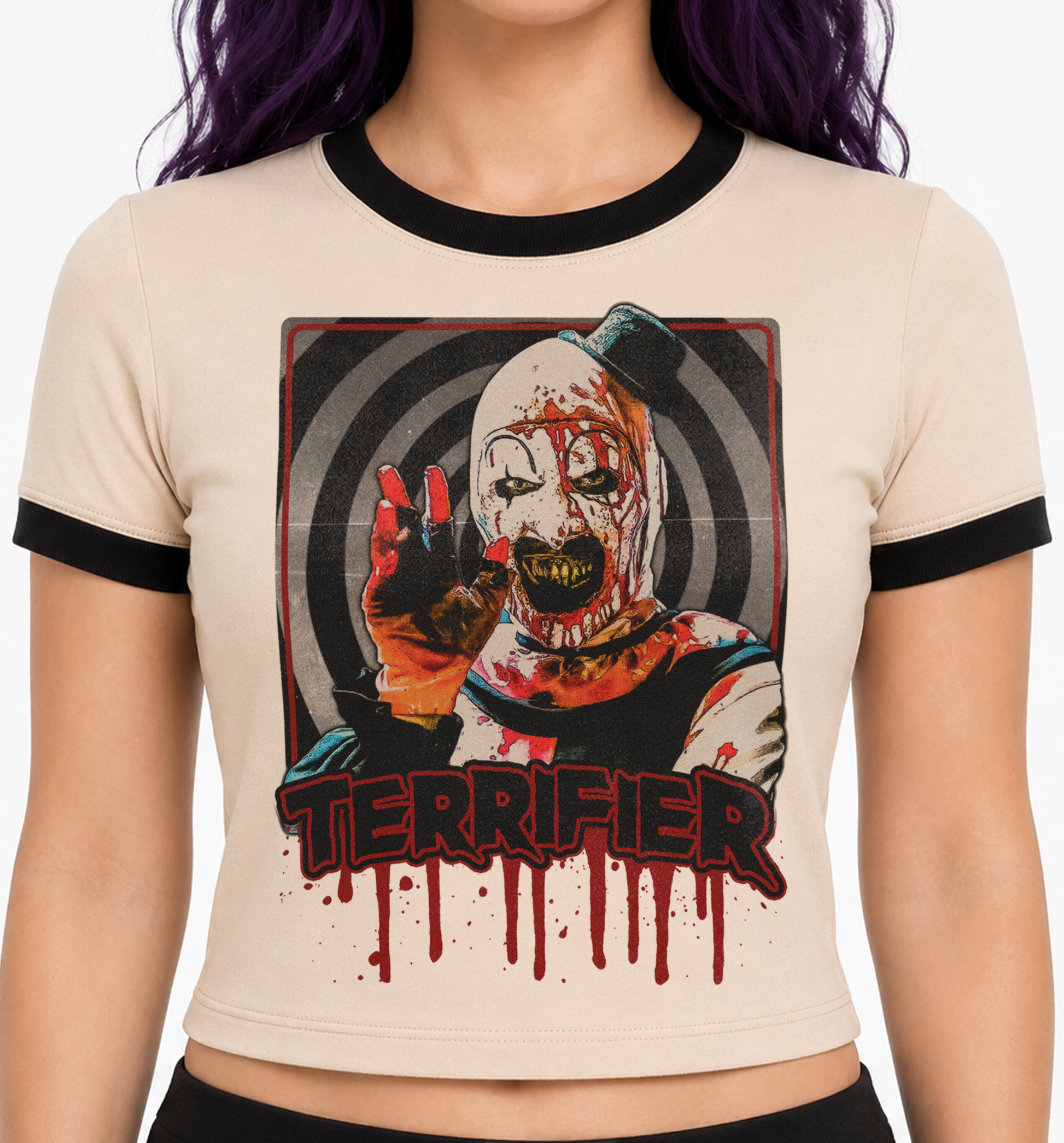 A cropped ringer t-shirt with a black crew neck and sleeve trim, featuring a graphic of a bloody clown and the word 'TERRIFIER' in dripping red letters. Art the clown horror tee shirt for women. horror tees for ladies women. women's terrifier art the clown blouse tshirt tee top. horror movie shirts dresses for women. gore whore tshirts for women. halloween horror shirts. ladies terrifier crop top tshirt. clown horror tshirt for ladies women. slasher horror tshirt for women ladies. goth horror shirts. punk.