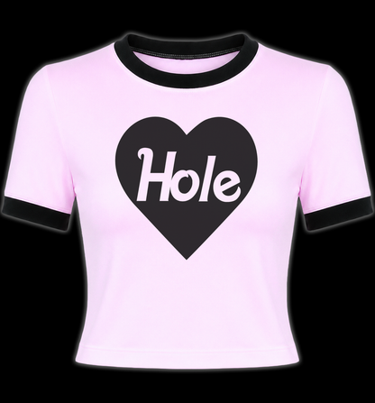 Hot Pink Girlie ringer t-shirt with black trim on the collar and sleeves, featuring a black heart graphic and the words 'HOLE' on the front.
Hole Courtney Love Crop Top Women's Tshirt tee. Grunge girl crop top shirt. Alternative clothing for women. Women's HOLE tshirt Crop Top. Women's band tshirt crop top. Women's rock crop top shirt. Women's band merch crop top. Women's HOLE Tee. Riot Grrrl Merch Tops. Courtney Love Hole Shirt for Women. Hole band merch for women.  Women's riot grrrl band merch. 90s alt