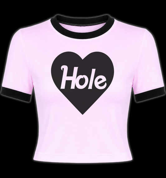 Hot Pink Girlie ringer t-shirt with black trim on the collar and sleeves, featuring a black heart graphic and the words 'HOLE' on the front.
Hole Courtney Love Crop Top Women's Tshirt tee. Grunge girl crop top shirt. Alternative clothing for women. Women's HOLE tshirt Crop Top. Women's band tshirt crop top. Women's rock crop top shirt. Women's band merch crop top. Women's HOLE Tee. Riot Grrrl Merch Tops. Courtney Love Hole Shirt for Women. Hole band merch for women.  Women's riot grrrl band merch. 90s alt