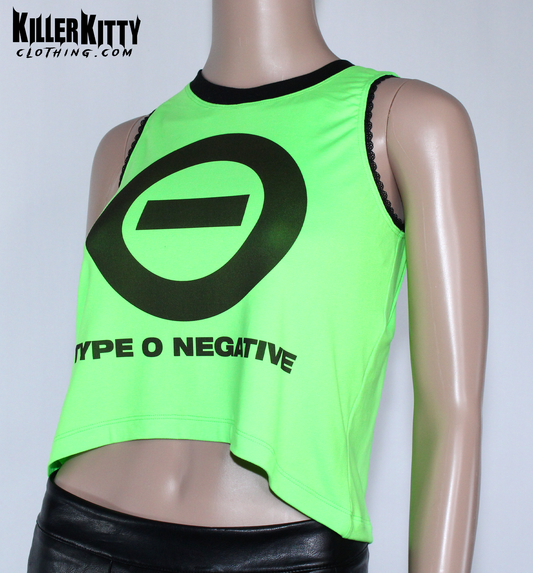 Women's Type O Negative tank top with a relaxed, slouchy fit. Peter Steele crop tank top. Top is neon green with the Type O Negative symbol logo on the front with "type o negative" underneath. Asymmetrical hem, black lace-edged arms and black crew neck. Band shirt.  Killer Kitty Clothing Alternative Brand. Neon green tank top with Type O Negative logo on a mannequin, branded as Killer Kitty Clothing.