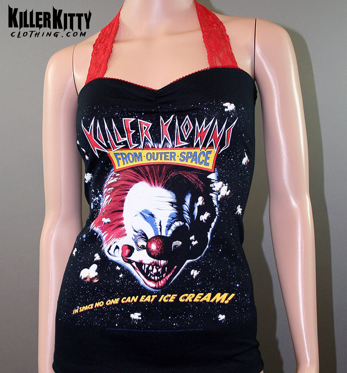 Killer Klowns from Outer Space, horror movie halter top with red lace straps and clown graphic, upcycled.
Black upcycled halter tank with Killer Klowns from Outer Space movie graphic, red picot trim, sweetheart neckline. horror movie shirt. 