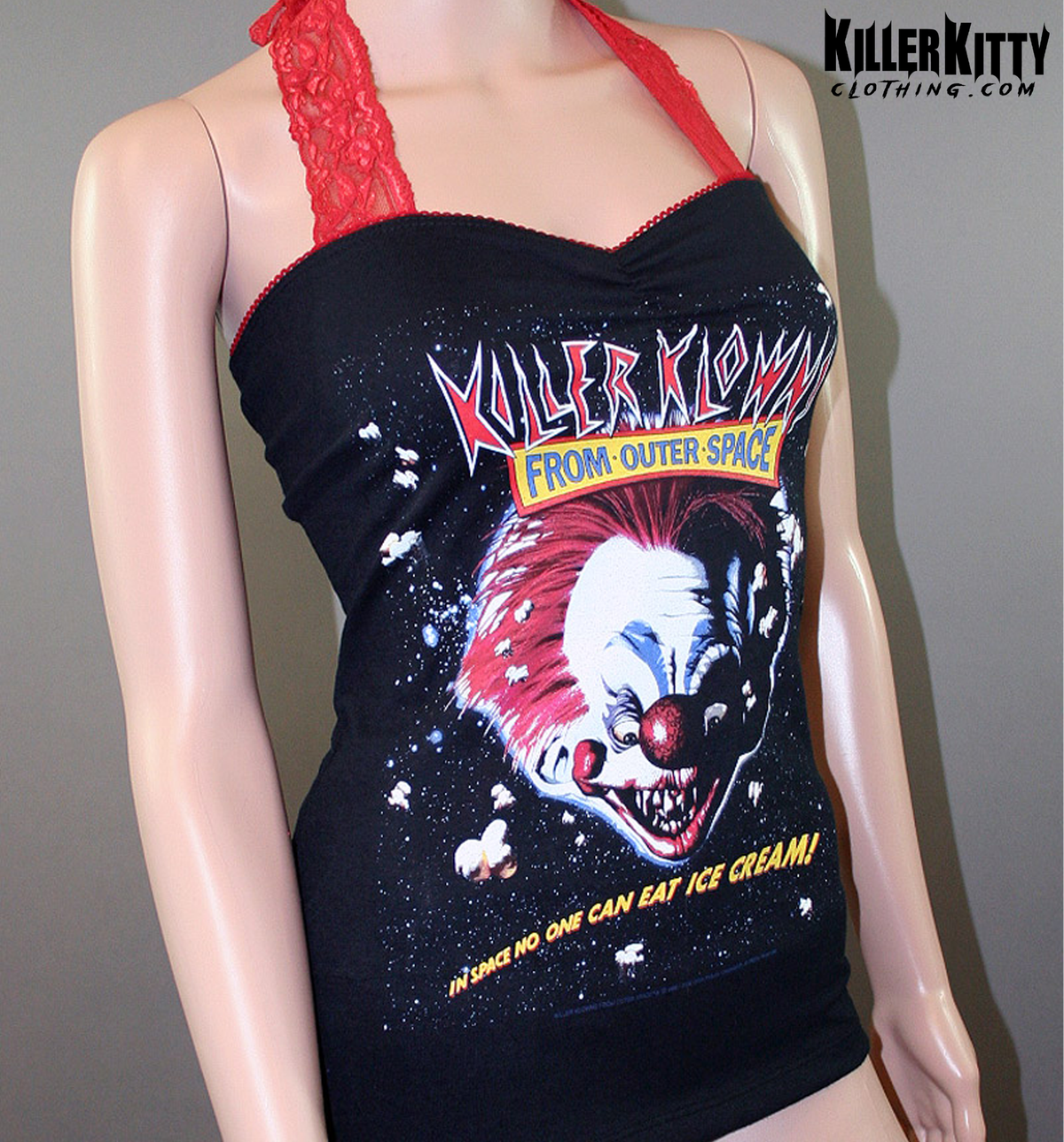 Killer Klowns from Outer Space, horror movie halter top with red lace straps and clown graphic, upcycled.
Black upcycled halter tank with Killer Klowns from Outer Space movie graphic, red picot trim, sweetheart neckline. horror movie shirt. 